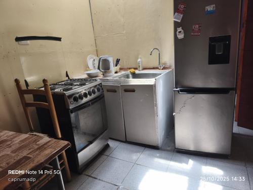 Nhà bếp/bếp nhỏ tại Cabañas Caprumadp, departamento