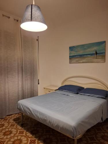 Ένα ή περισσότερα κρεβάτια σε δωμάτιο στο DA BETTY - Mondo Antico experience