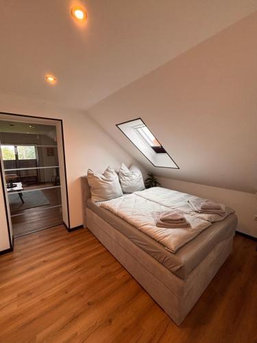 Postel nebo postele na pokoji v ubytování Idyllische Ferienwohnung