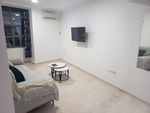 Μια τηλεόραση ή/και κέντρο ψυχαγωγίας στο Appartement hyper centre avec vue exceptionnelle de Hammamet