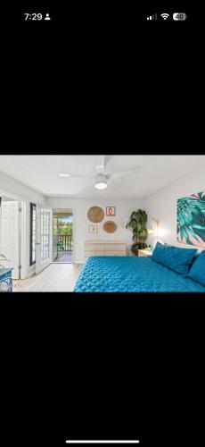 Giường trong phòng chung tại Reef Retreat