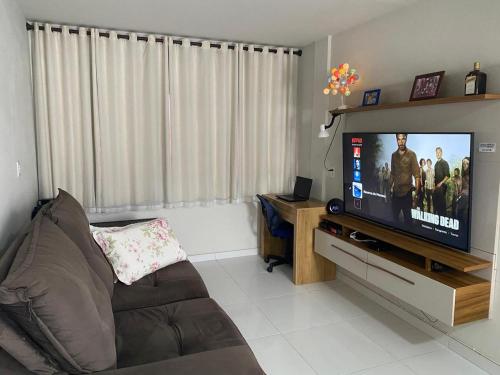 TV a/nebo společenská místnost v ubytování Reserva do Moreno