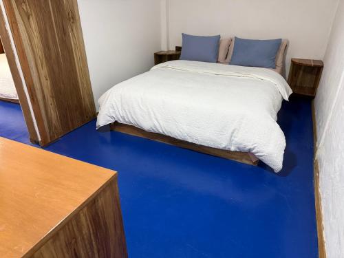 Postel nebo postele na pokoji v ubytování La Escondida