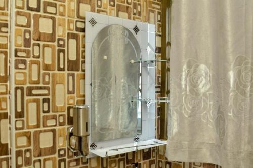 Ένα μπάνιο στο Villaggio Budu Room 1