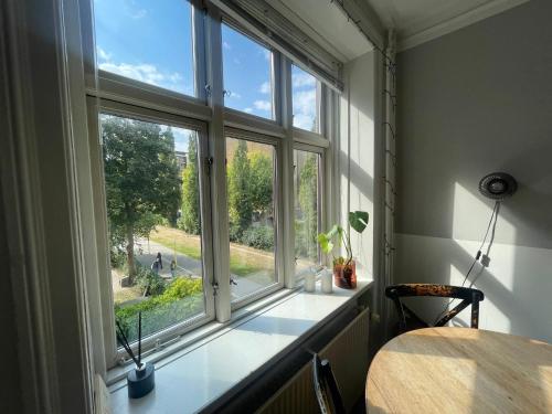 a window in a room with a view of a street at Apartment in heart of Amager in Copenhagen
