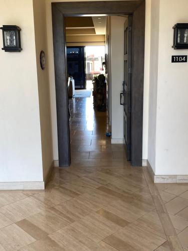 a hallway of a building with a hallwayngth at Copala At Quivira-Poolside Ground Floor Oceanview in Cabo San Lucas