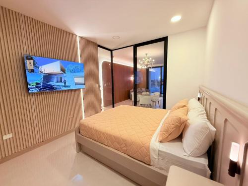 Postel nebo postele na pokoji v ubytování Suite de Lujo Plaza Noah