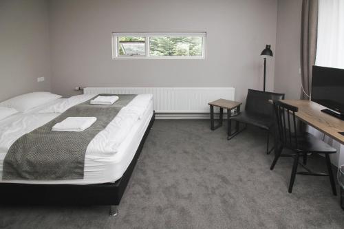 Postel nebo postele na pokoji v ubytování Bella Apartments & Rooms