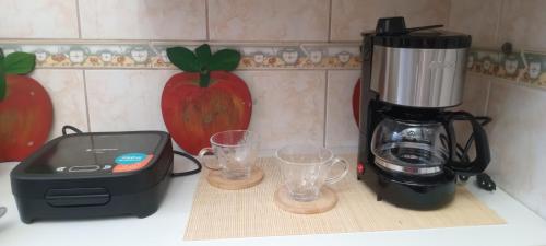 Lindo apto frente mar em região privilegiada de Santosにあるコーヒーまたはお茶