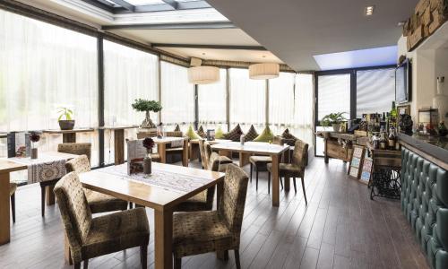 Un restaurant u otro lugar para comer en Hotel Florian