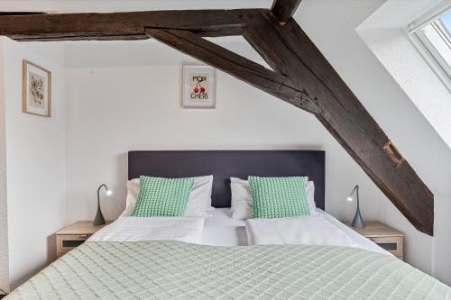 Ένα ή περισσότερα κρεβάτια σε δωμάτιο στο Charmante Hotelwohnung nahe Pforzheim, ruhige Lage