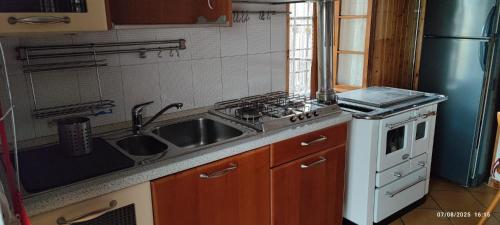 Kuchyň nebo kuchyňský kout v ubytování Case Pelati