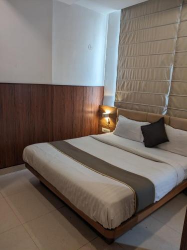 Ένα ή περισσότερα κρεβάτια σε δωμάτιο στο Mount bliss nainital