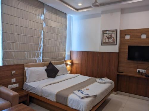 Ένα ή περισσότερα κρεβάτια σε δωμάτιο στο Mount bliss nainital