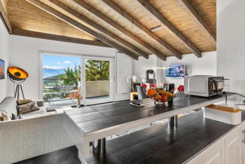 Crans-Montana 6 pers, grand appart rénové avec balcon, vue & parking