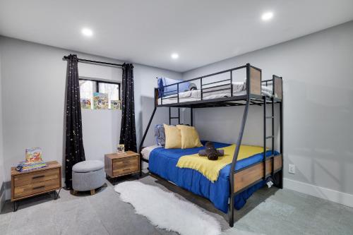 a bedroom with a bunk bed with a teddy bear on it at 3bd 2ba hot tub, game room, bunk beds in Long Pond