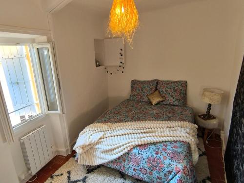 Postel nebo postele na pokoji v ubytování Maison de la liberté