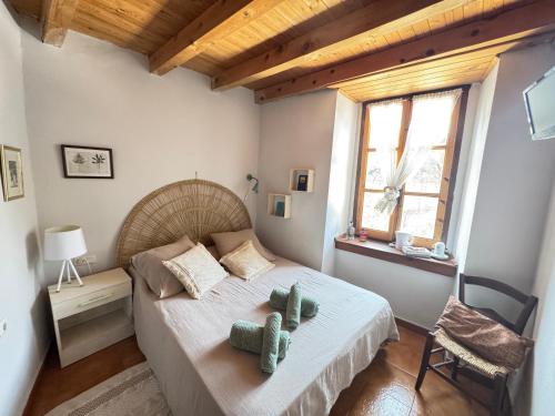 Postel nebo postele na pokoji v ubytování Casa Uishera