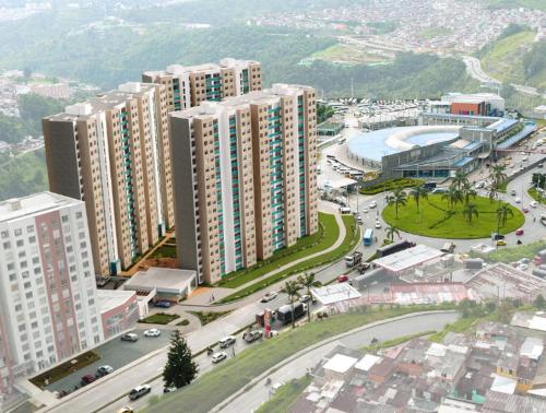 an aerial view of a city with tall buildings at Simplemente en Casa! in Manizales