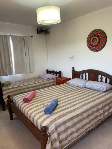 En eller flere senge i et værelse på URQU WAYRA