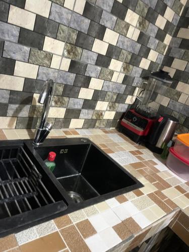 Η κουζίνα ή μικρή κουζίνα στο TID apartments