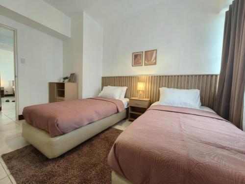 Postel nebo postele na pokoji v ubytování Ocean and City Views 3BR 3BA Cebu Condo with Parking