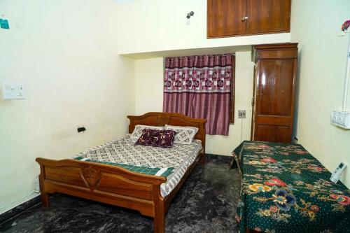 Ένα ή περισσότερα κρεβάτια σε δωμάτιο στο La Maison D&N