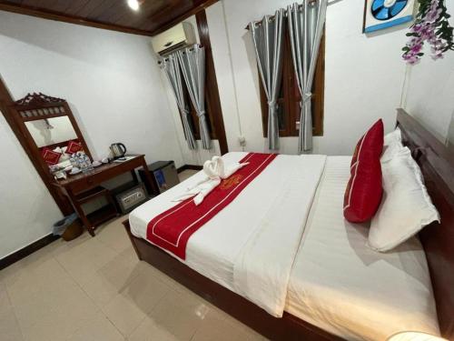 Ένα ή περισσότερα κρεβάτια σε δωμάτιο στο Villa ouis namkhan river