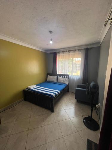 Postel nebo postele na pokoji v ubytování Vine suites