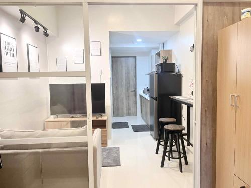 TV a/nebo společenská místnost v ubytování Greenthumbs Staycation