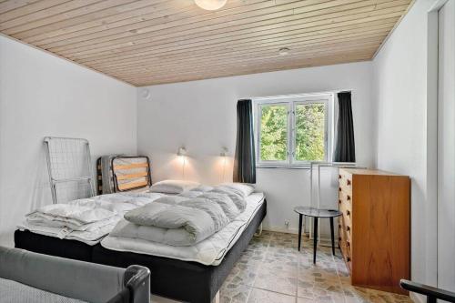 Postel nebo postele na pokoji v ubytování FY357-Frorup-Kystvej-7
