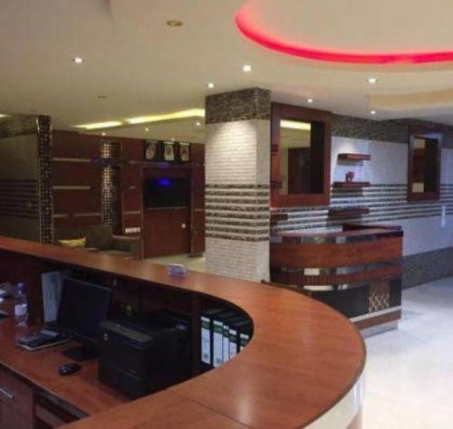 an office with a desk with a computer on it at اصداء الراحة 