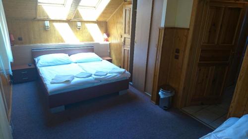  Penzion U Zvonku -  Room  picture :   TV    Free toiletries    Fan                           