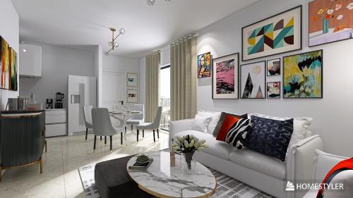 a living room with a couch and a table at Apartamento San Andrés 