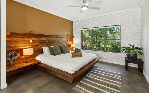 Ένα ή περισσότερα κρεβάτια σε δωμάτιο στο Hidden Grove