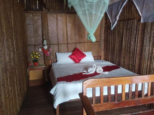 Postel nebo postele na pokoji v ubytování Tatai Natural Resort