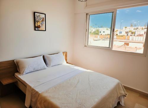 Postel nebo postele na pokoji v ubytování Signature Villa à la Plage