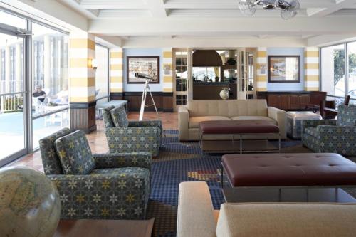 a lobby with couches and chairs and a living room at Pan American Oceanfront Hotel in Wildwood Crest