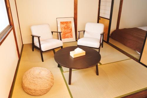 Χώρος καθιστικού στο Cozy Fukui
