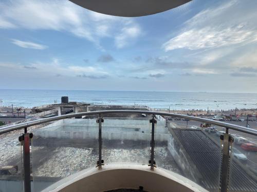 a view of the ocean from the top of a building at The Maanvik Shores Luxury Home Stay - RK Beach in Visakhapatnam