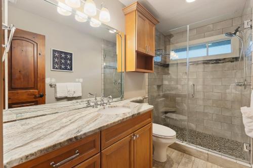 a bathroom with a sink and a toilet at FR480: 480 Fiddlers Reach in Kiawah Island