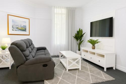 Μια τηλεόραση ή/και κέντρο ψυχαγωγίας στο Anzac Executive Apartments Brisbane