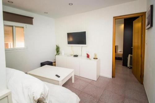 Ένα μπάνιο στο Coqueto Apartamento 50m de playa