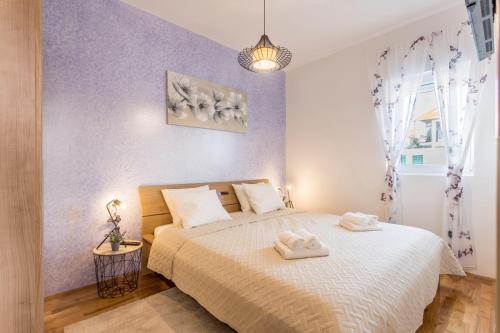 Postel nebo postele na pokoji v ubytování Villa Tango I