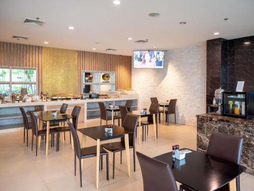 Et tv og/eller underholdning på Grand Mercure Bangkok Asoke Residence