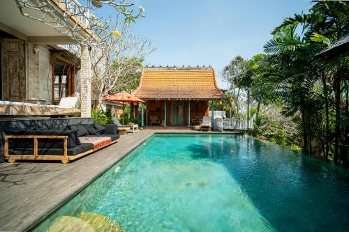 Bazén v ubytování Villa Uma Priyayi nebo v jeho okolí