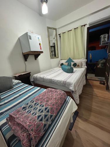 Postel nebo postele na pokoji v ubytování Suíte de Lane e Mú 2