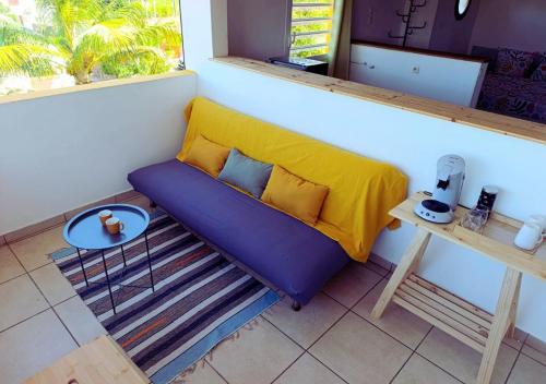 Ruang duduk di Les Alizées - Pleasant & Sea View