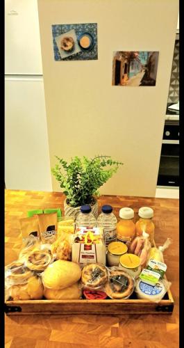 a tray filled with different types of food on a table at Casa Papillon in Sagres