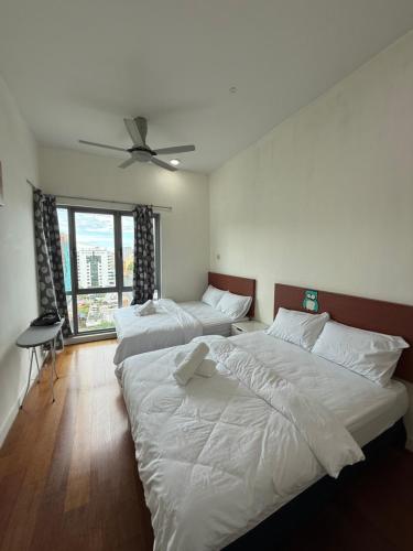 Giường trong phòng chung tại 21Homestay Imago